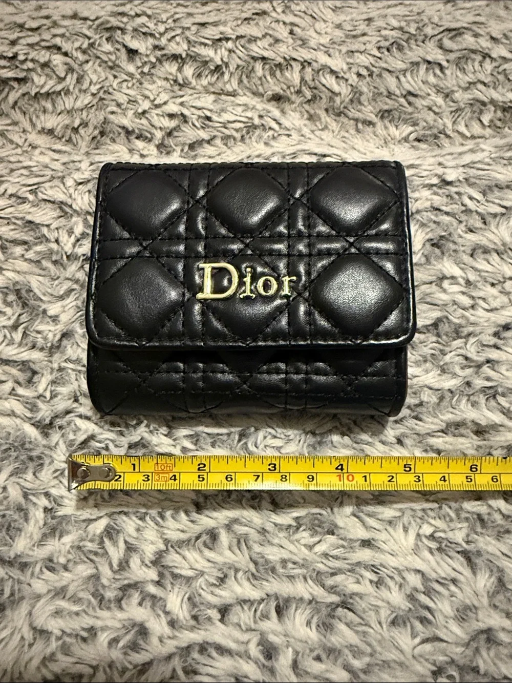 Black Quilted Trifold Wallet with Gold Logo